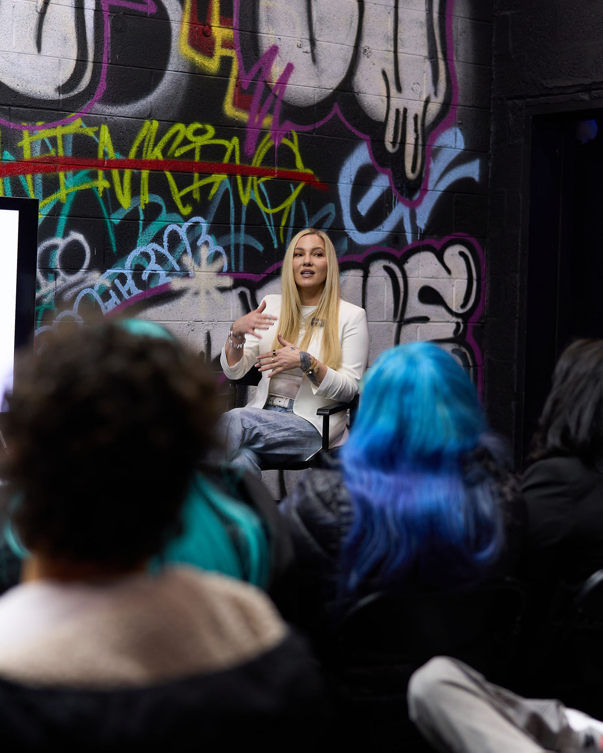 a speaker presenting to workshop attendees