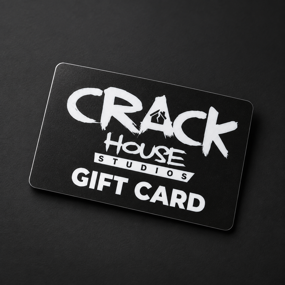 crack house studios gift card on a charcoal background