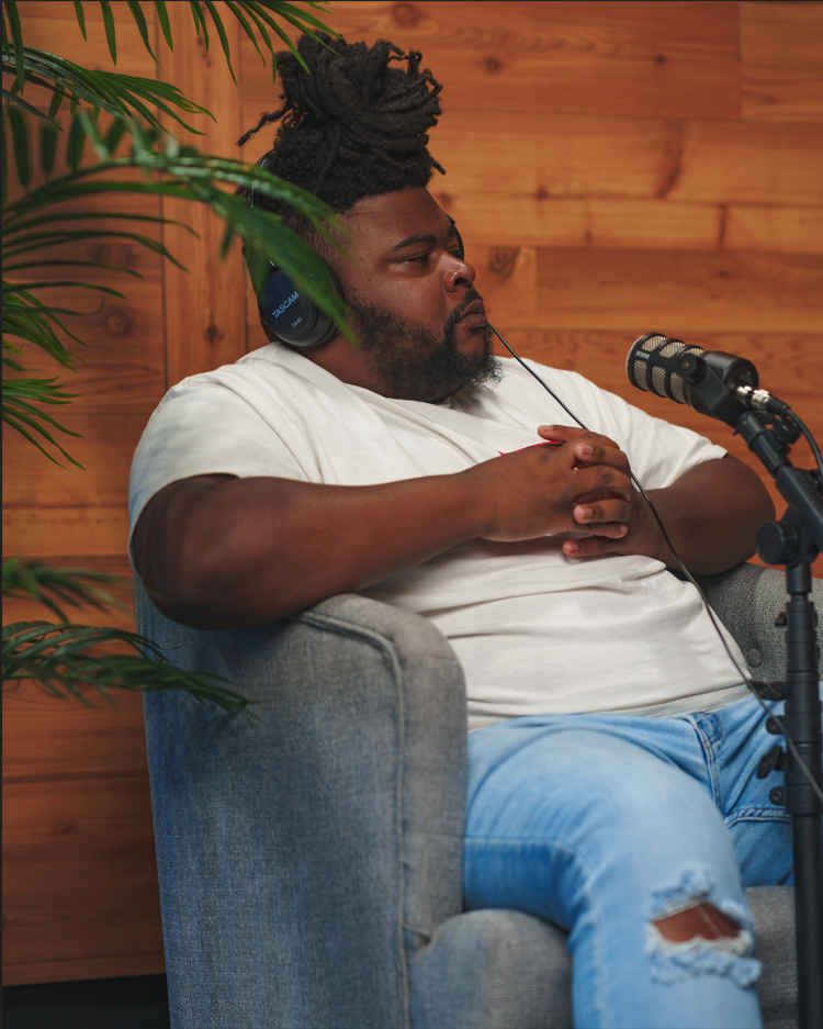 Guest recording a conversation in the studio