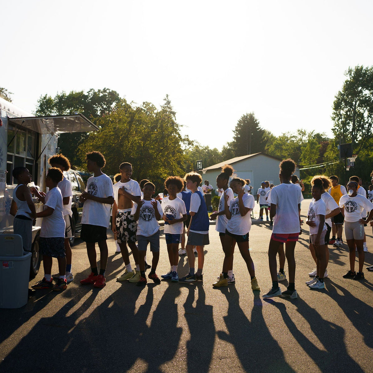 wide event photograph of a youth basketball camp in Lansing